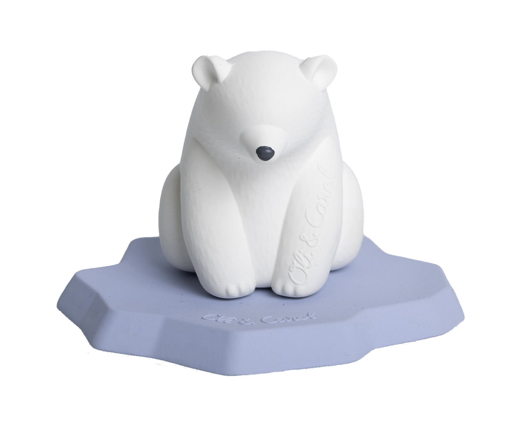 White polar bear chewable toy on a blue base of ice with Oli & Carol branding.