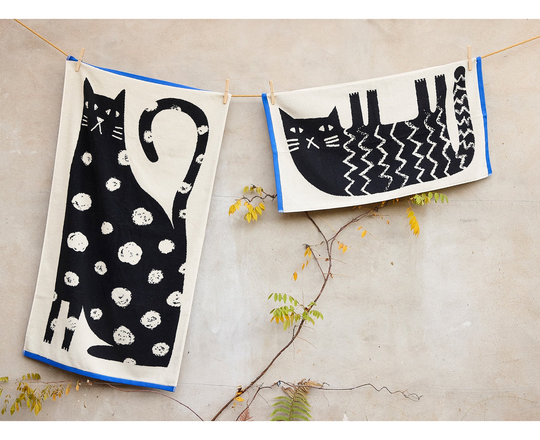 Lazy Cat Towels by Donna Wilson